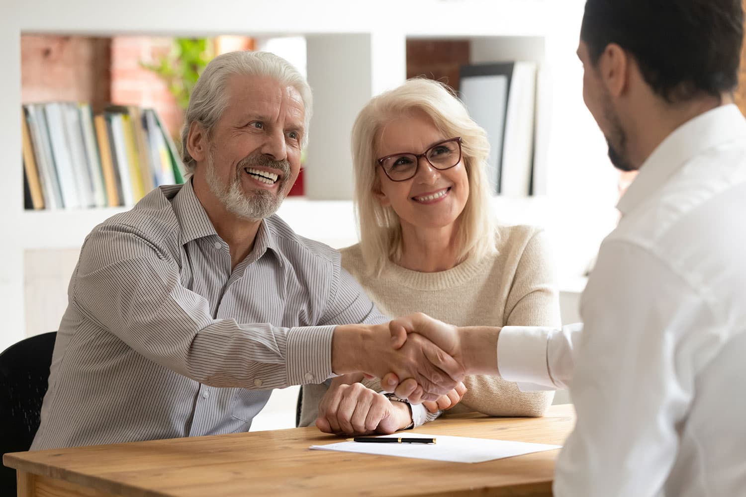 older couple meeting with trust advisor