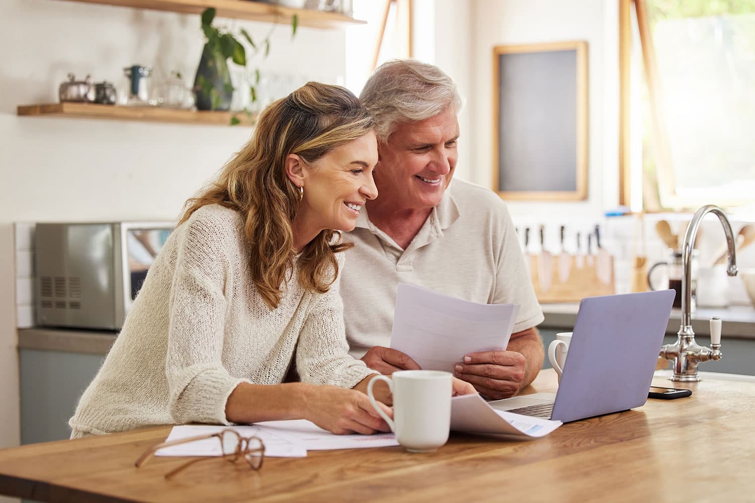 Couple looking at finances on the computer